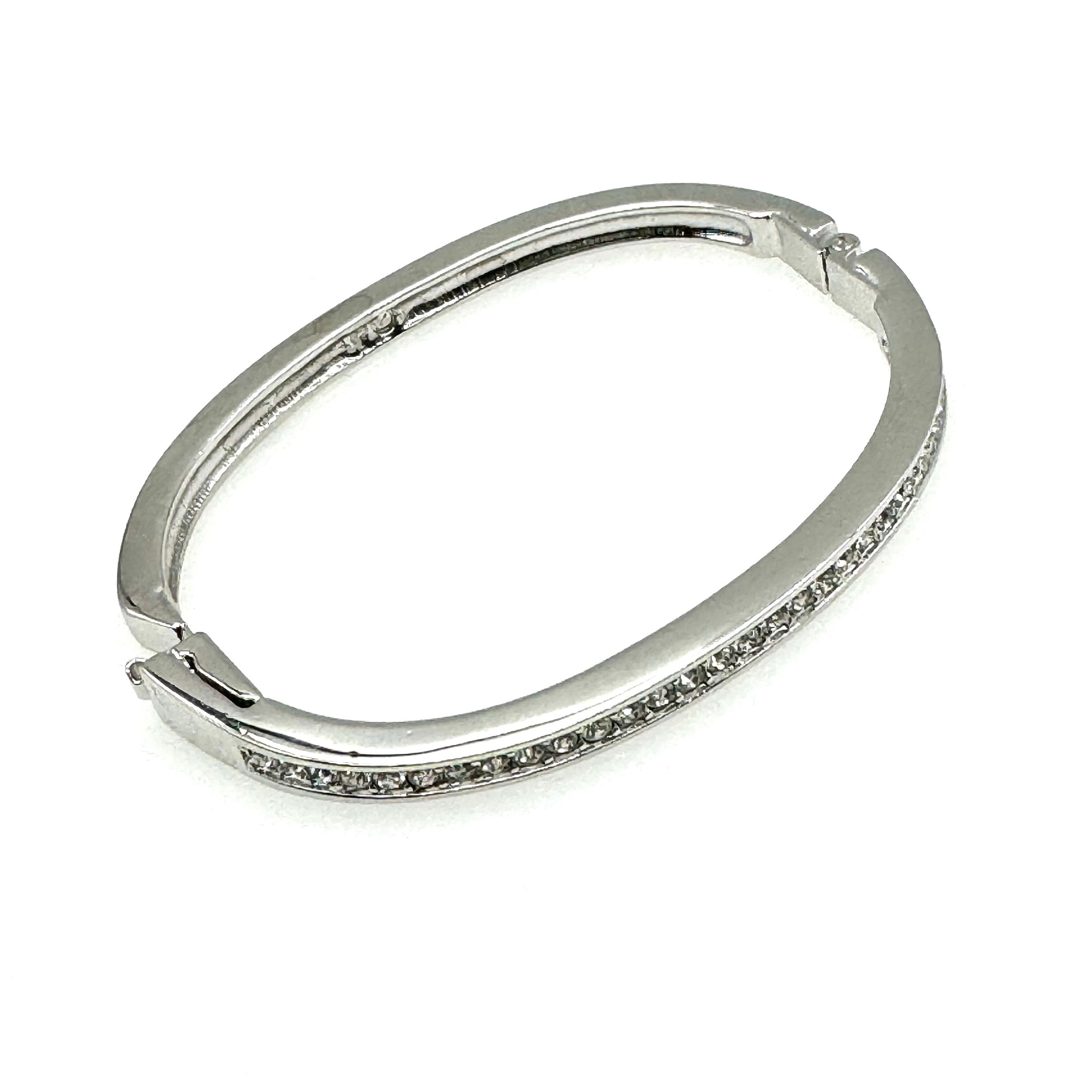 Swarovski (Swan Hallmark) Rhodium Plated Crystal Hinged Bangle