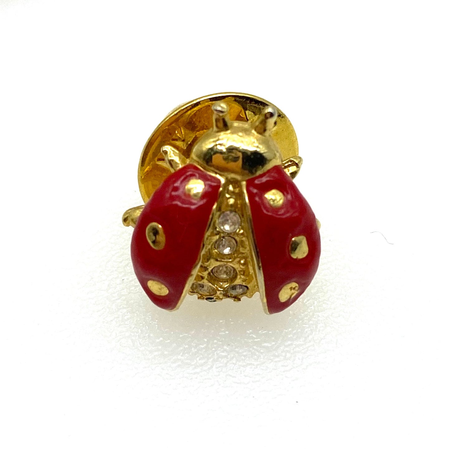 Avon (signed S©P on reverse) duet ladybird pin/leaf brooch