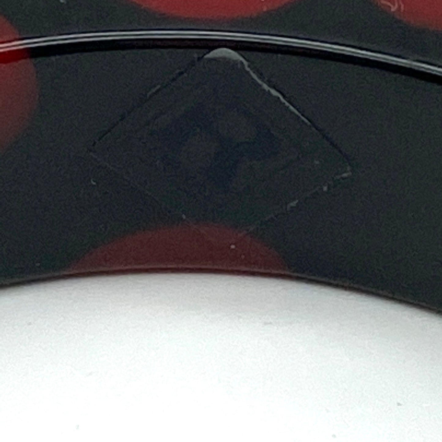 Bracelet Sobral à pois noir/rouge avec autocollant