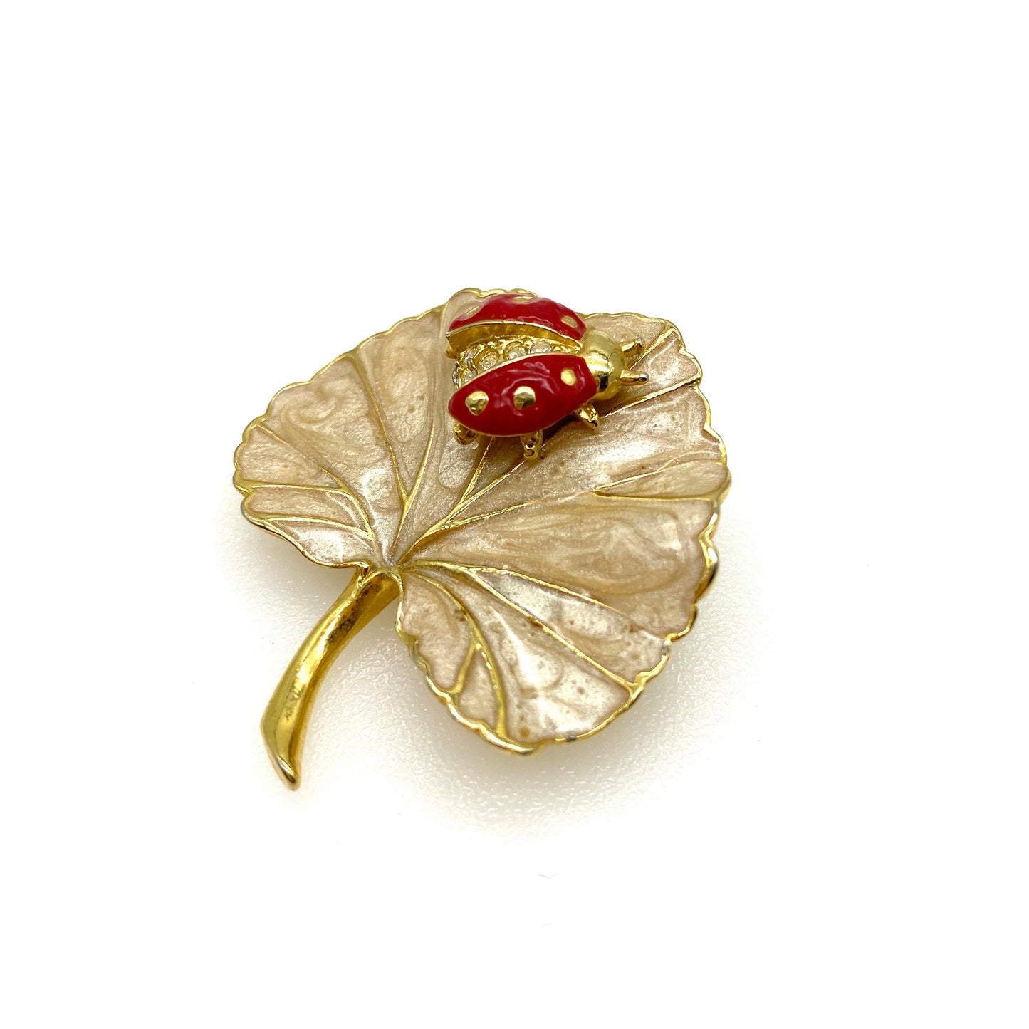 Avon (signed S©P on reverse) duet ladybird pin/leaf brooch