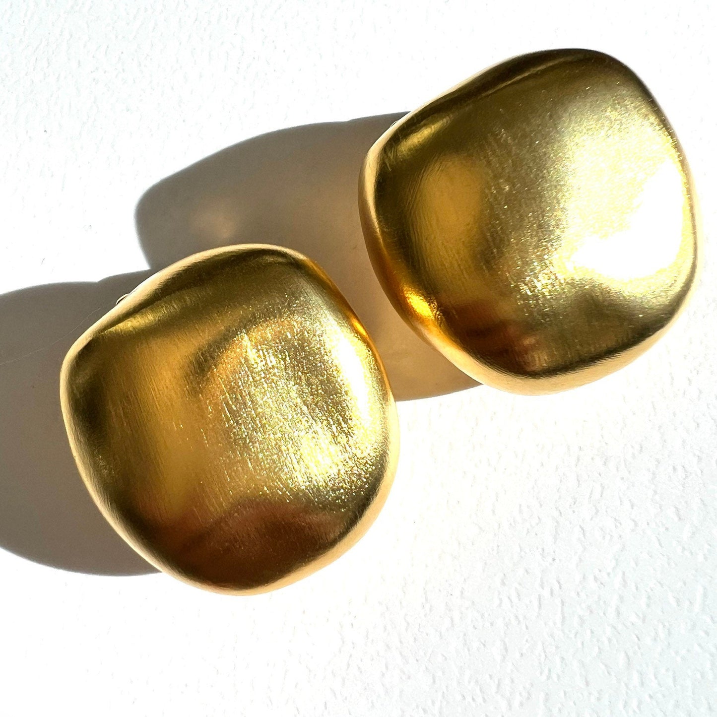 Kenneth Lane Satin/Matte Gold Plated Undulating Nugget Domed Clip On Earrings