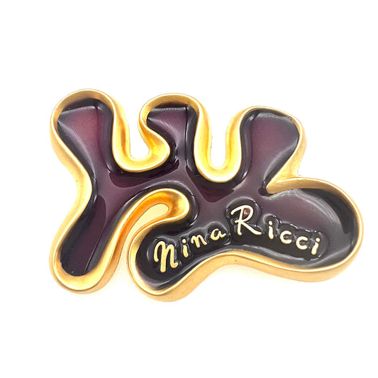 Broche avec logo en émail violet Nina Ricci