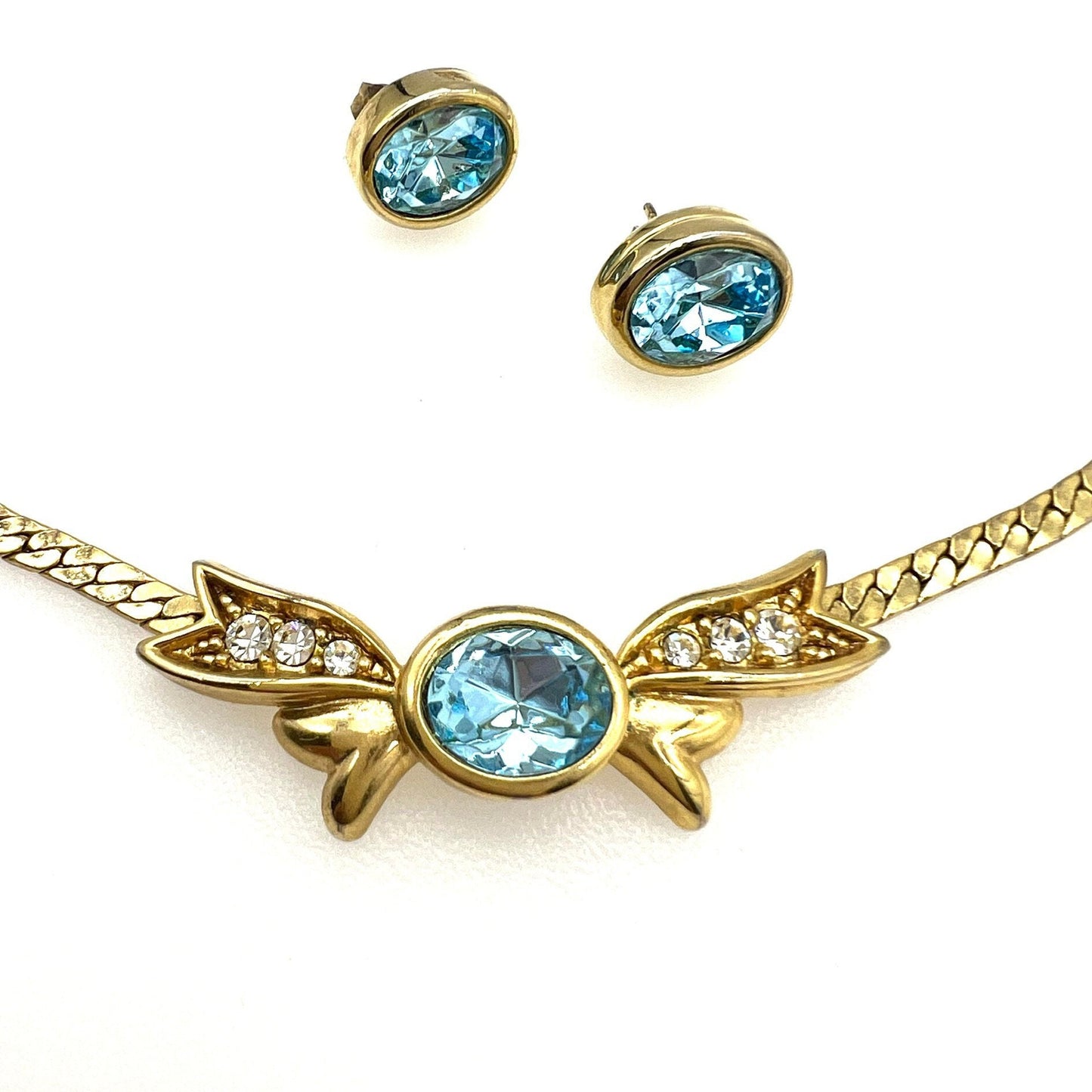 Sky Blue Necklace with Integral Bow Pendant and Matching Pierced Earring Set